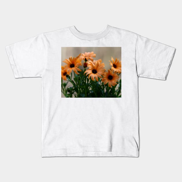 Pale orange flowers Kids T-Shirt by ikshvaku